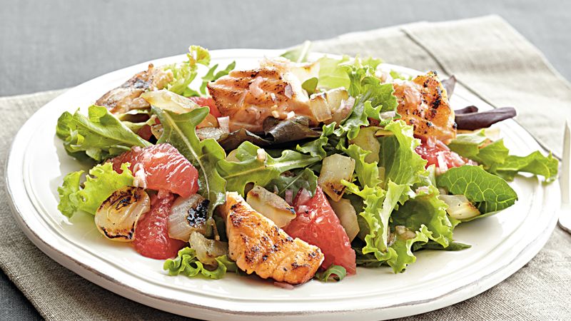 A picture of baked salmon with grapfruit salad